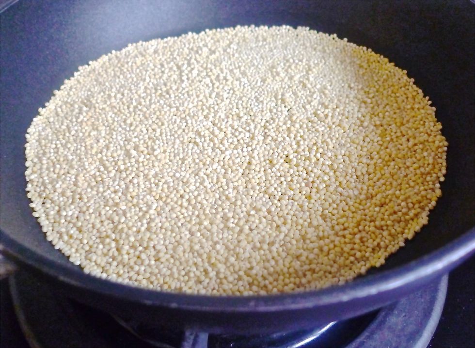 Toast millet on medium heat, shaking often until you start to hear them crackle, pop and is lightly browned. Remove and set aside.