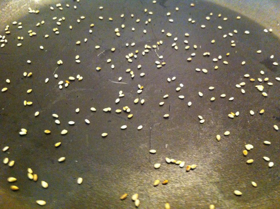 Toast sesame seeds in dry pan