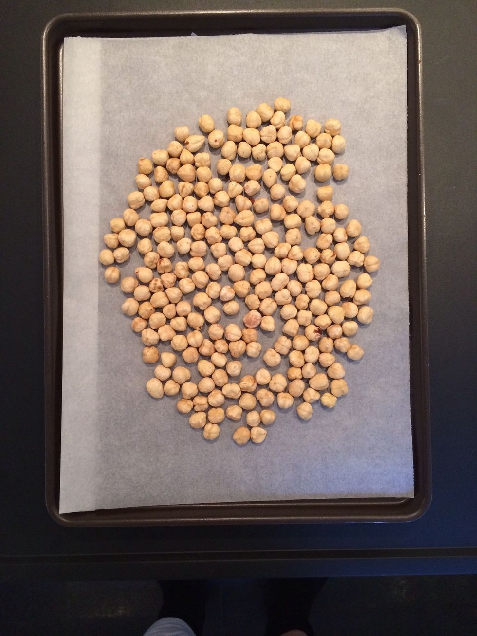 Toast the hazelnuts. I bought them peeled. But if you don't find that. You can just toast them, put them in a kitchen towel. Rub and the skin will go