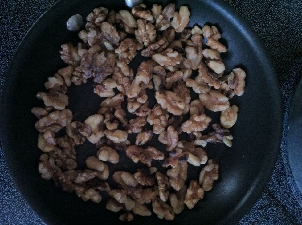 Toast walnuts. Keep and an eye on them and stir often to keep from scorching.
