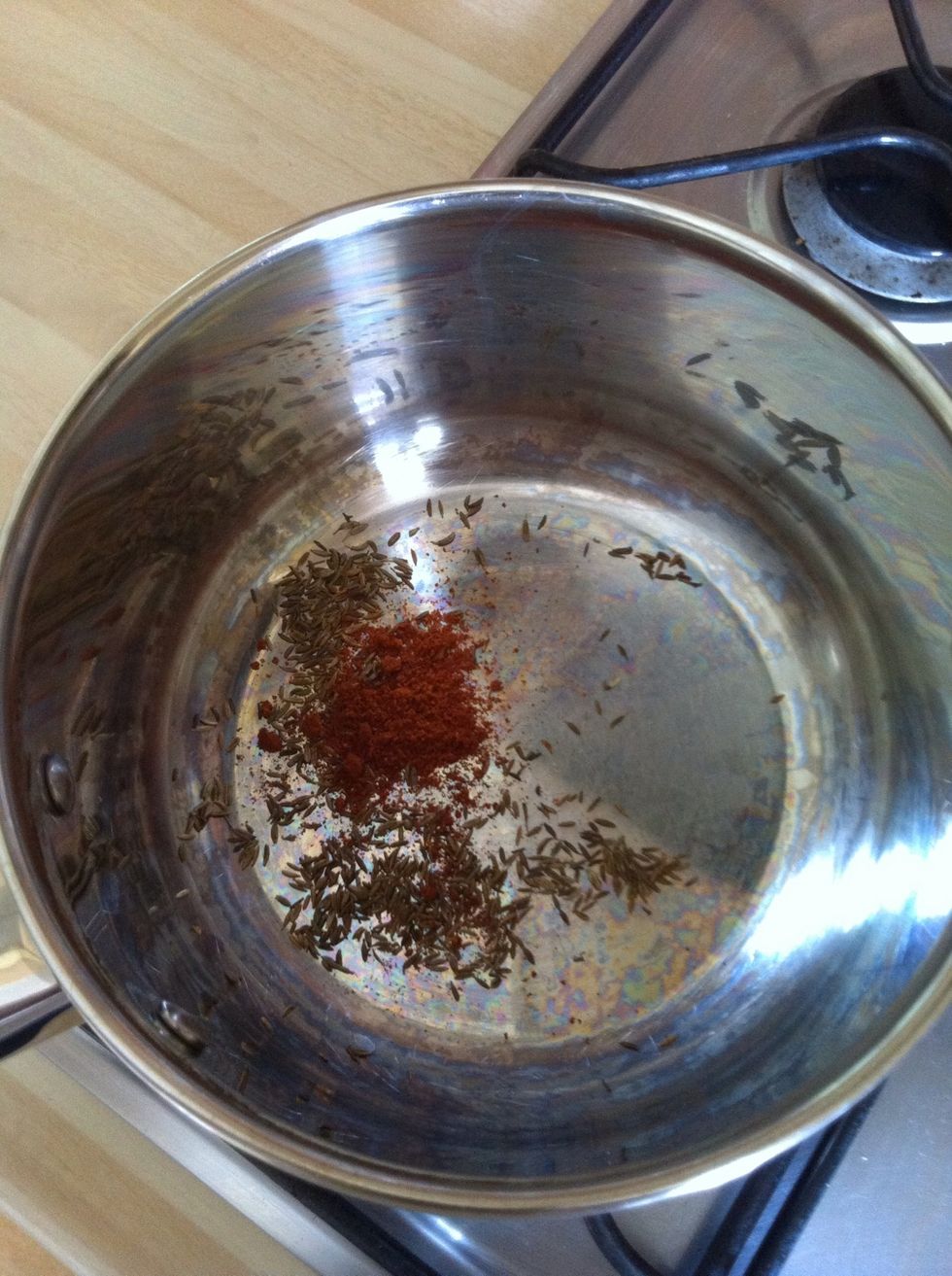 Toast your cumin seeds and chilli flakes/ powder in a dry saucepan (no oil) for 1 minute. It says add a pinch of chilli but I add about half a tsp as I like spice, it's jut your personal preference :)
