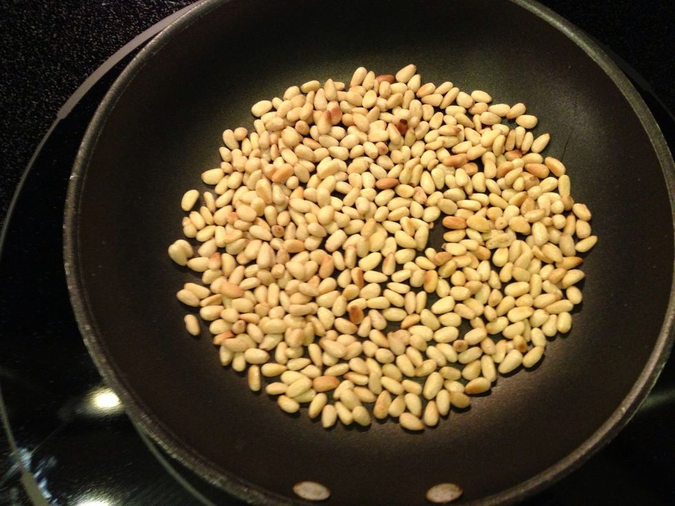 Toasting the pine nuts "wakes up" the oils and intensifies their flavor.