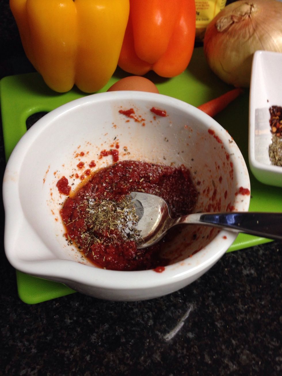 tomato paste, olive oil, and herbs