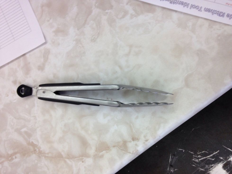 Tongs   To pickup things like lettuce in a salad.  I can use tongs to pick up salad without getting my hands all over it.