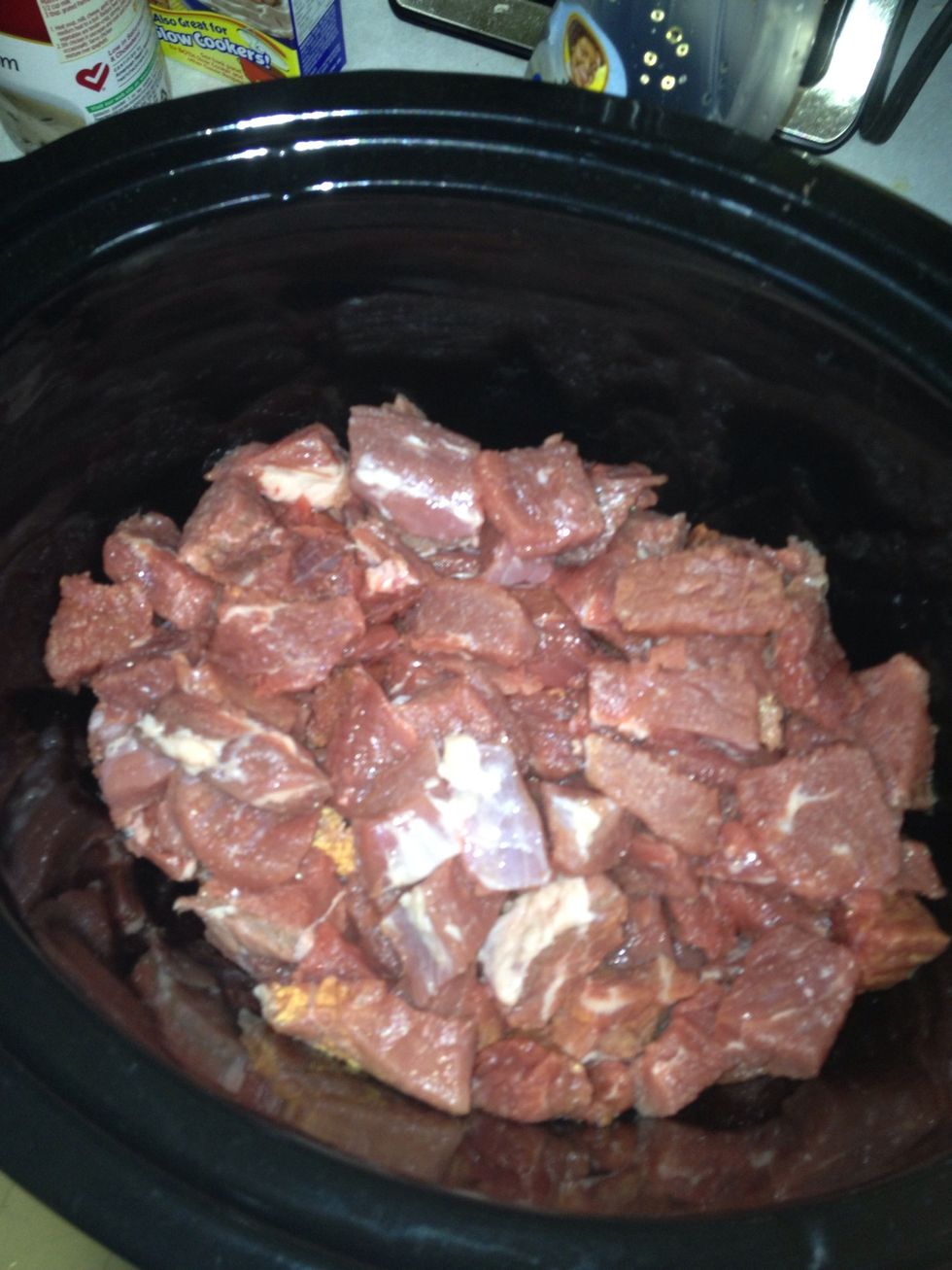 Took my beef and cut it into tips. Place the tips into crockpot.