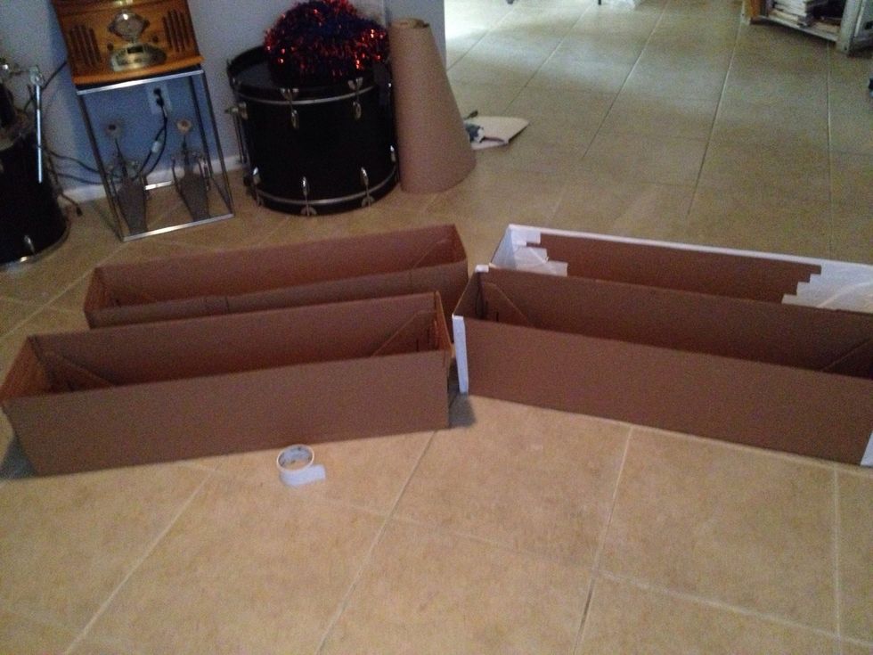 Took these cardboard end pieces from Ikea box springs, so trusty duct tape and vwala- free99 bookcase!