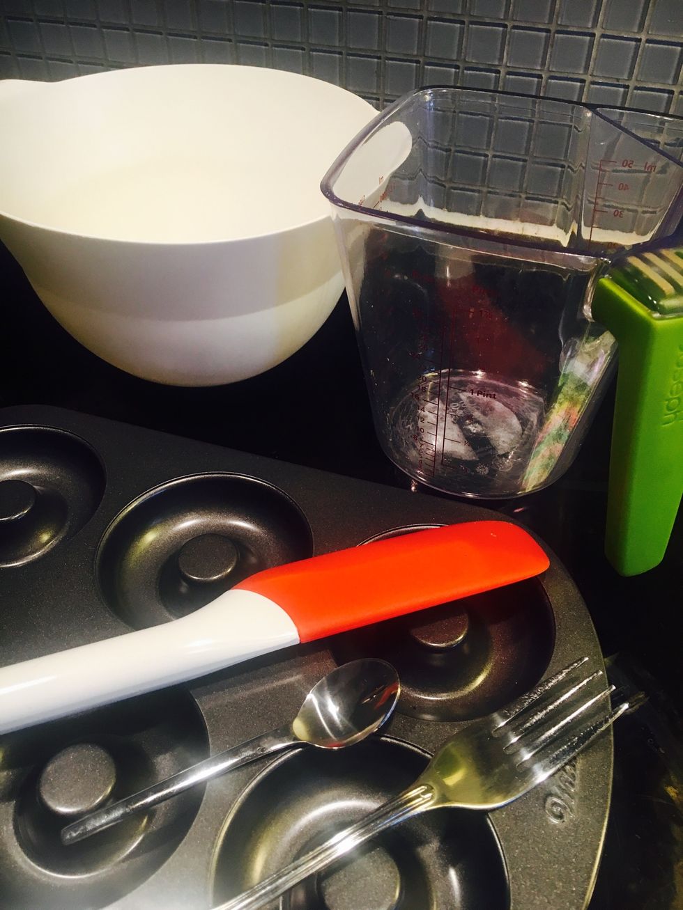 Tools: bowl, fork, teaspoon, spatula, doughnut tray (non-stick), measuring jug