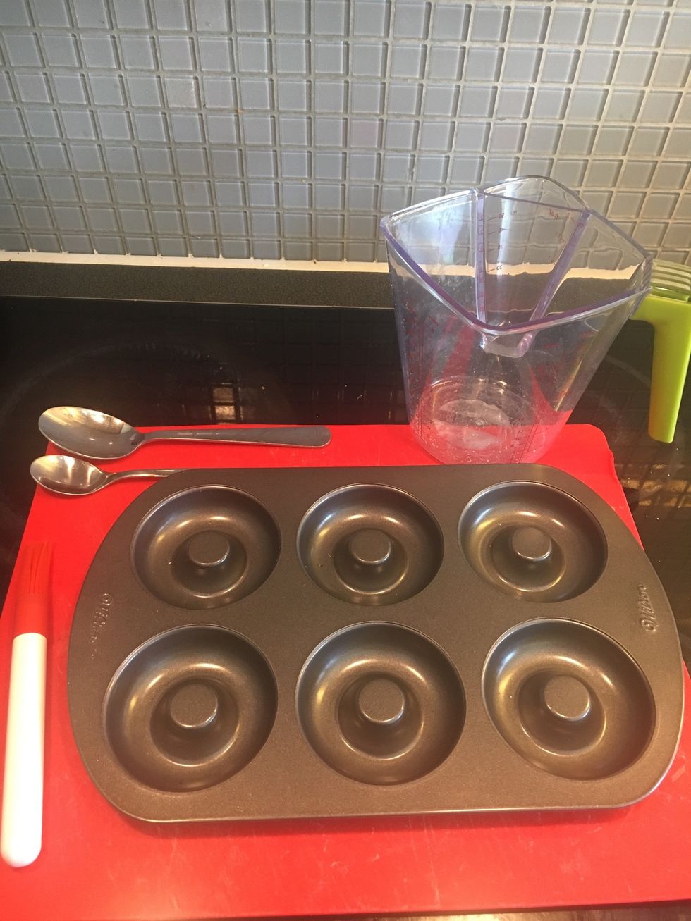 Tools: measuring jug, chopping board, knife, food brush, tablespoon, teaspoon, doughnut tray (non-stick)