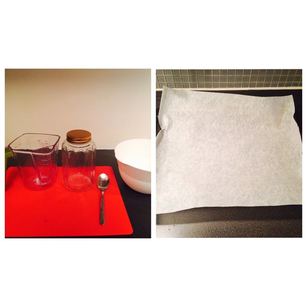 Tools: measuring jug, tablespoon, bowl, baking tray, parchment paper for baking, container for granola with lid