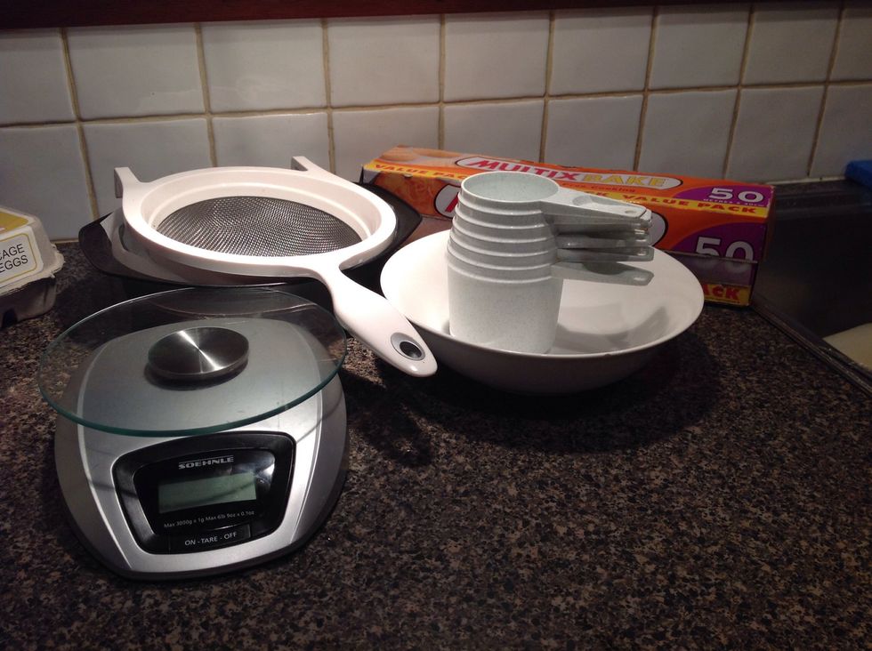 TOOLS: Weighs, Sift, Bowl, Pan, Measuring Cups, Baking paper, Measuring spoons, Wooden spoon, Towel, Mittens, Apple cutter, knife. (those last 6 things weren't in photo)