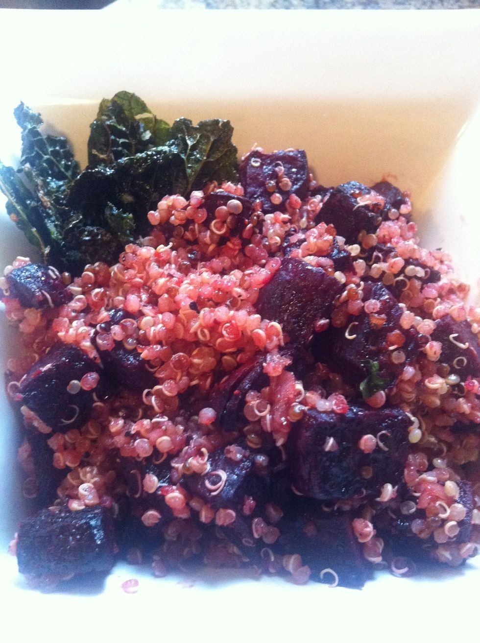 Top a handful of the roasted kale with the quinoa/beet mixture. Add feta or a poached egg as an option. Serve warm. Enjoy!