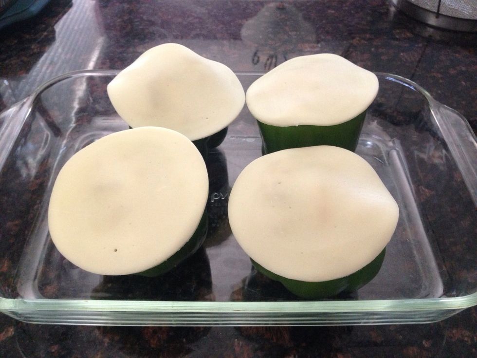 Top each pepper with 1 slice of provolone cheese. Put into a Pre heated oven and cook for 35 minutes.