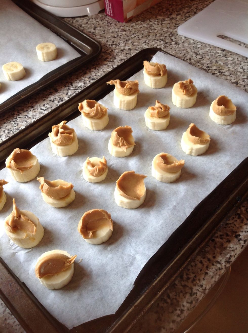 Top each slice with a spoon of peanut butter.