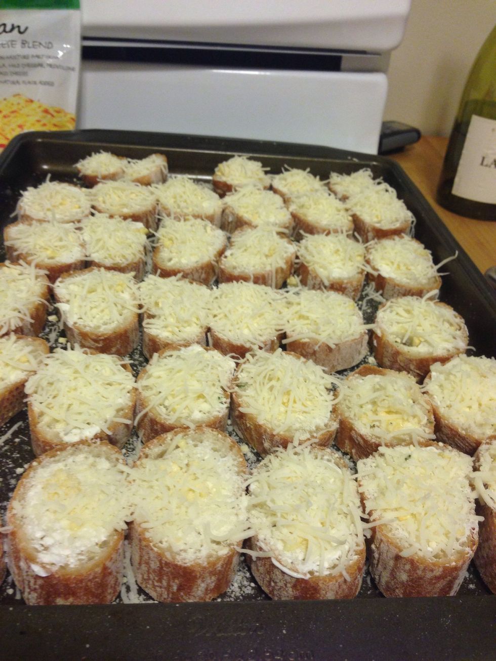 Top each slice with Italian cheese. I believe I used about 1/4 c per baguette.