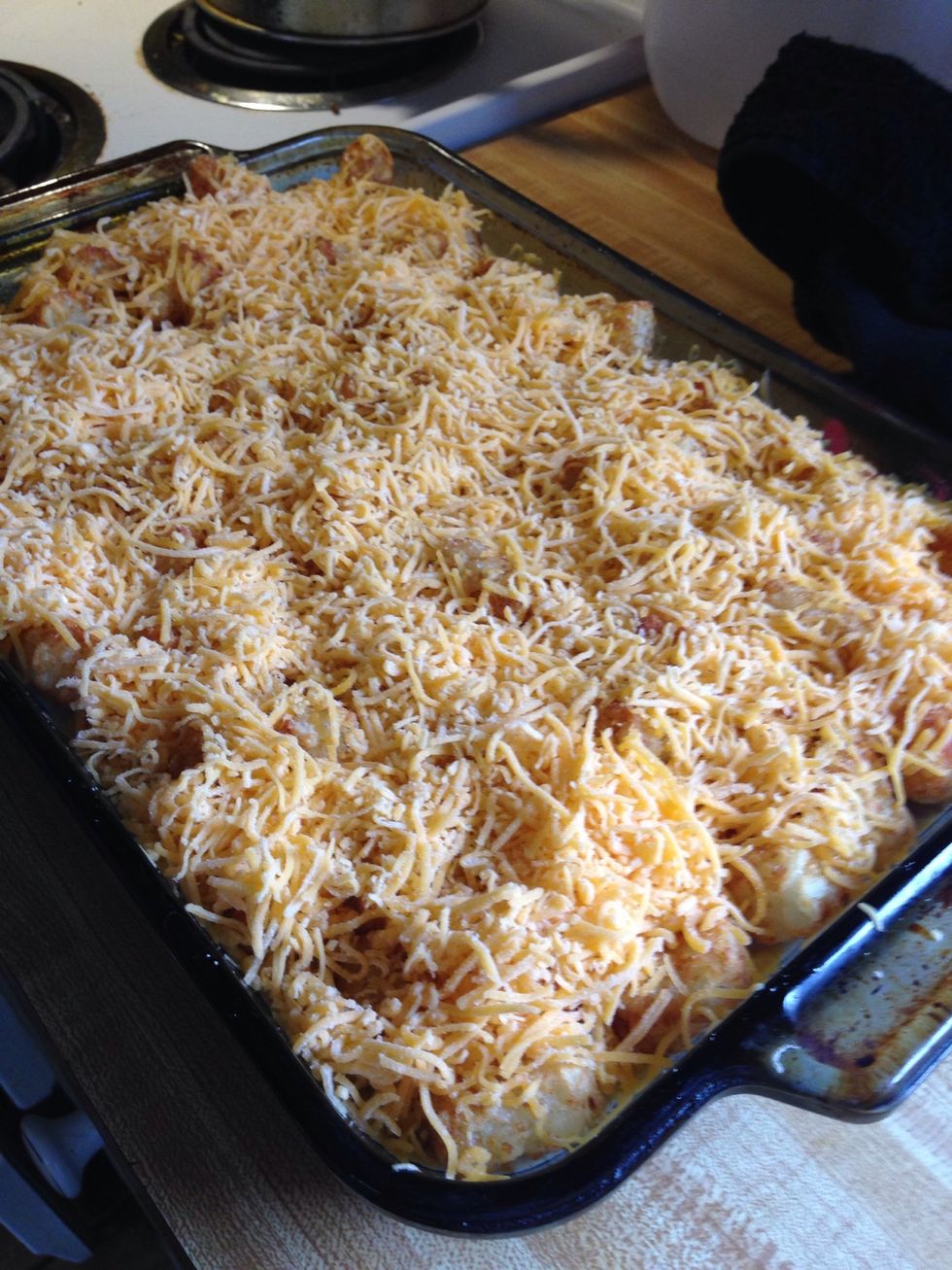 Top evenly with cheddar cheese and return to oven for appx 10 minutes or until cheese is slightly golden and bubbly....