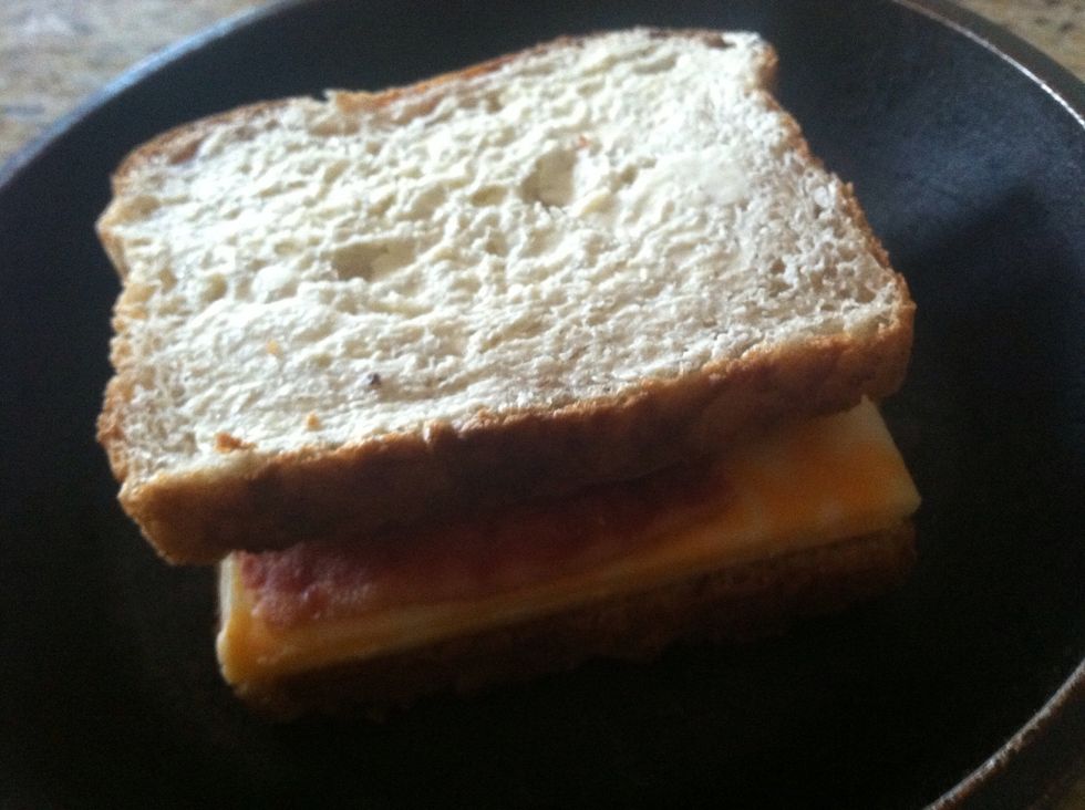 Top it off with the last slice of bread butter side up