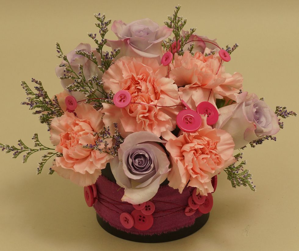 Top off by adding a strand of Button Wire over the flowers.