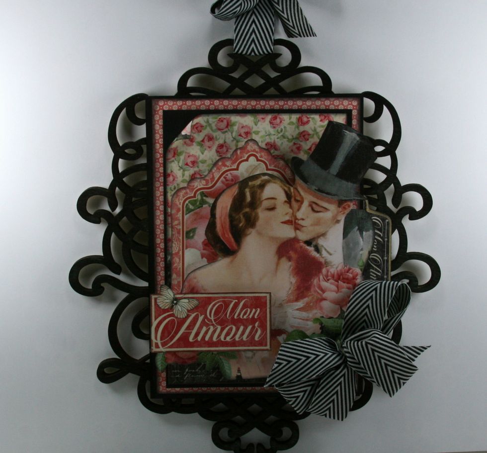 Top off with fussy cut sentiment. Secure poofy bow to corner.