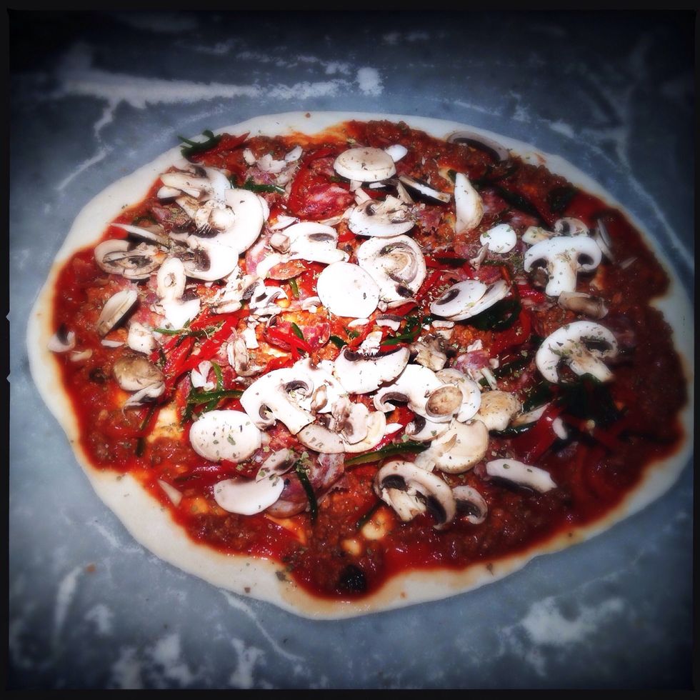 Top one with tomato, ragu, mushrooms, fresh chilli & spicy salami