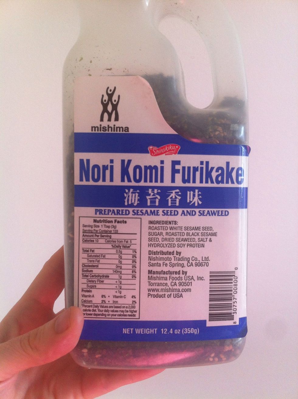 Top rice with some yummy furikake. It gives your rice a crunchy and unique flavor!