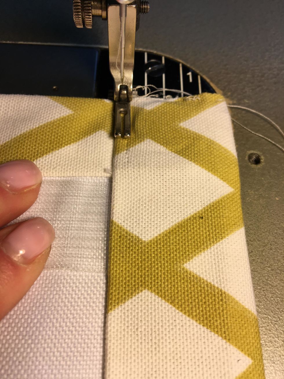 Top stitch the top header (if you are using the clips) as close to the edge as possible catching the magnet tape.