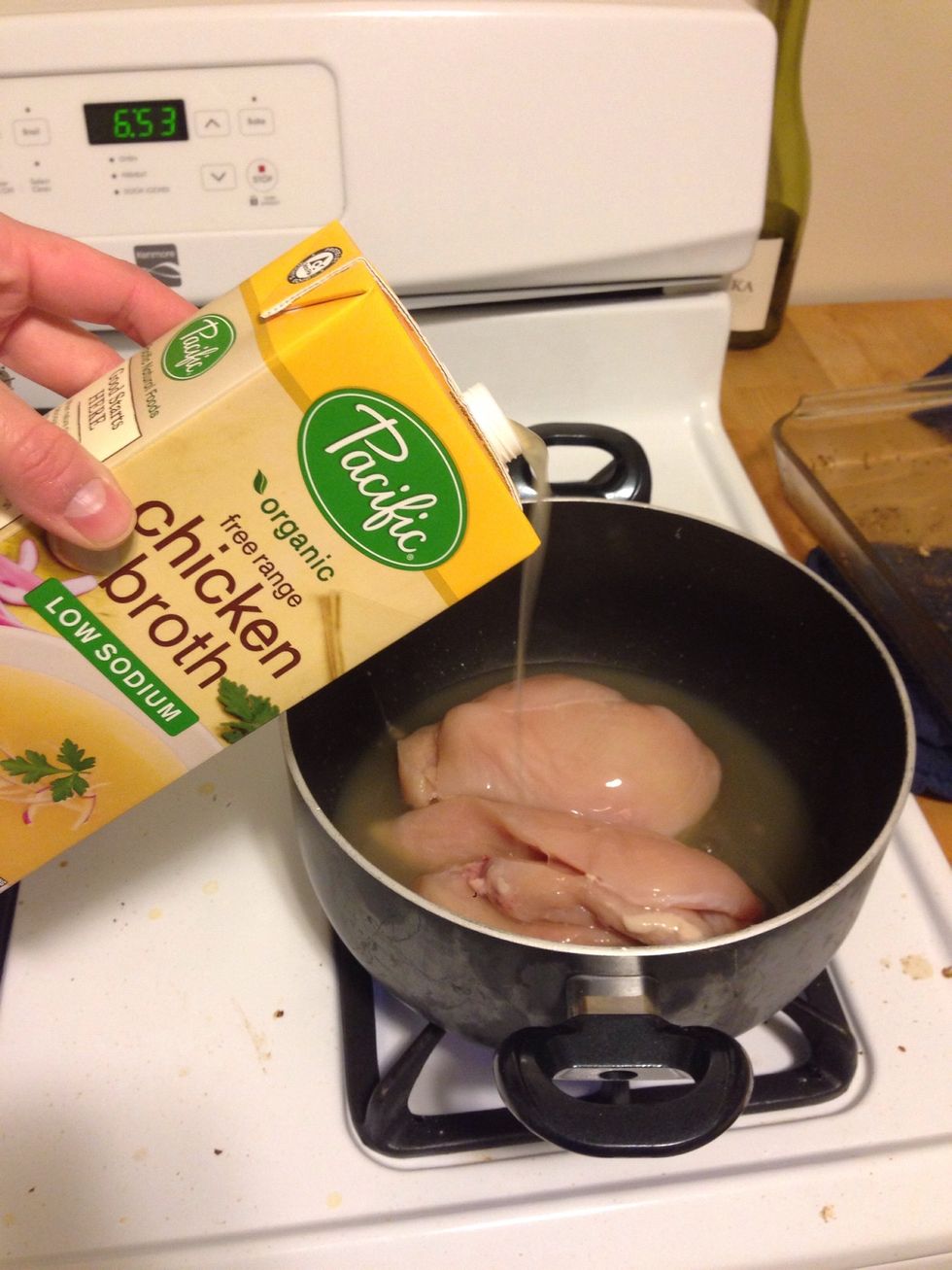 Top the chicken with 1 c of chicken broth. If you have more chicken, just make sure a majority of the breasts are covered.