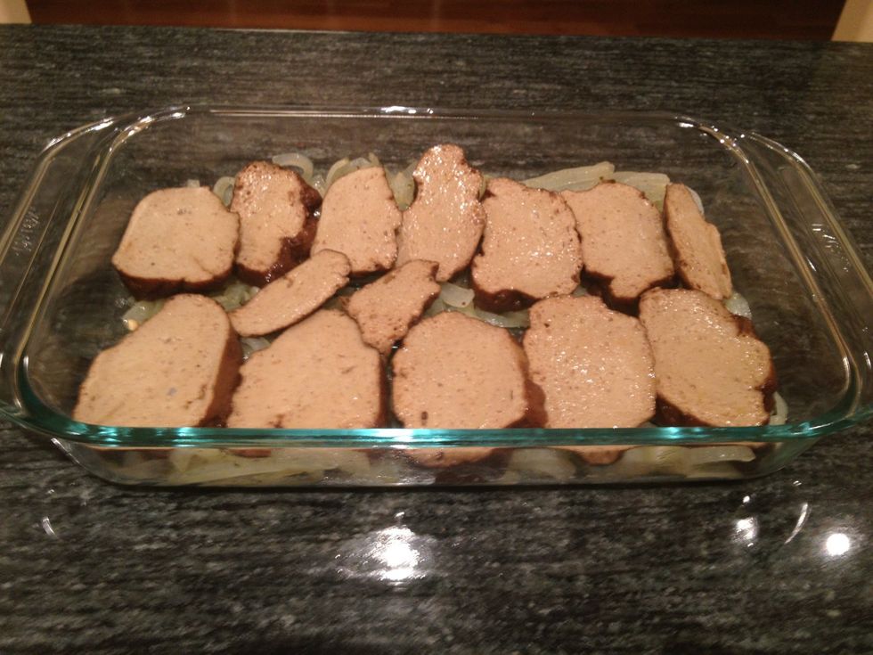 Top the onions with the slice of seitan.