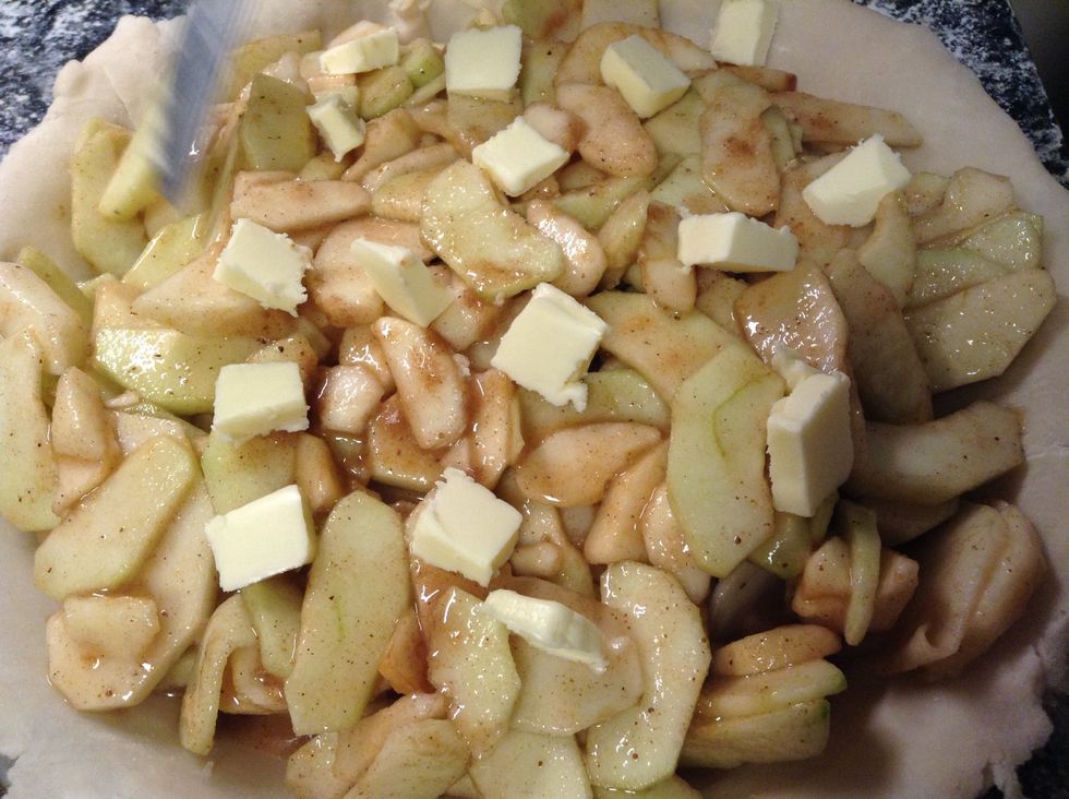 Top with 2 tablespoons of cut up butter.