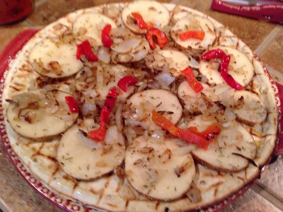 Top with a few roasted red peppers from the jar.