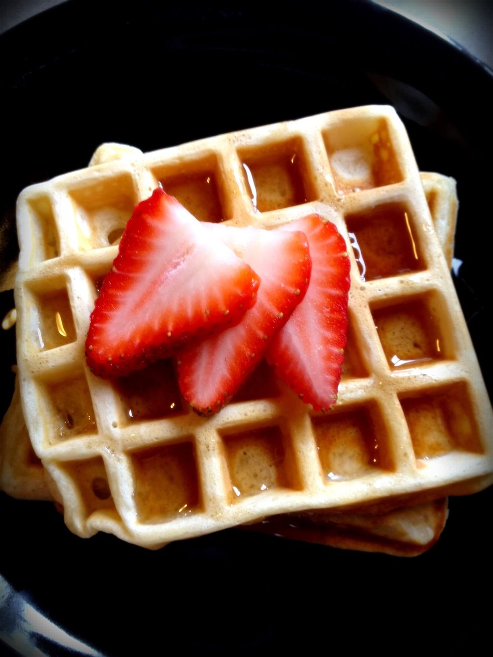 Top with butter and maple syrup, strawberries and whipped cream, or whatever you like.