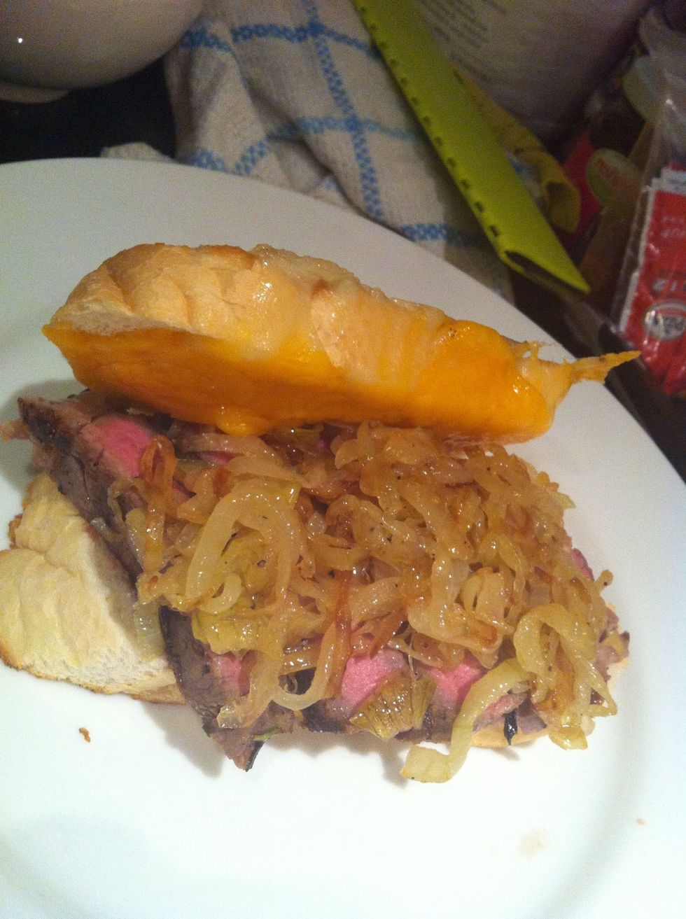 Top with caramelize onion then ur melted cheese bread on top