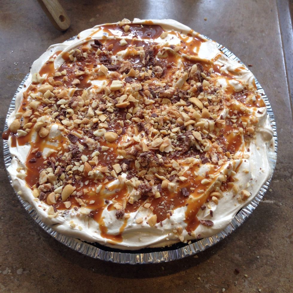 Top with remaining chopped snickers and peanuts. You can also drizzle top of pie with melted chocolate or Hershey's!