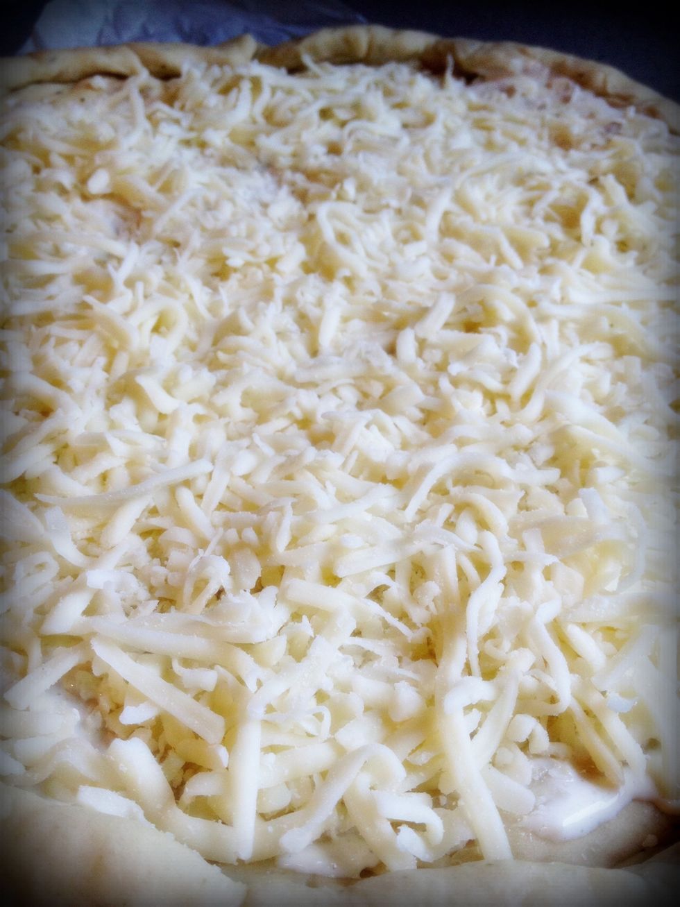 Top with shredded mozzarella