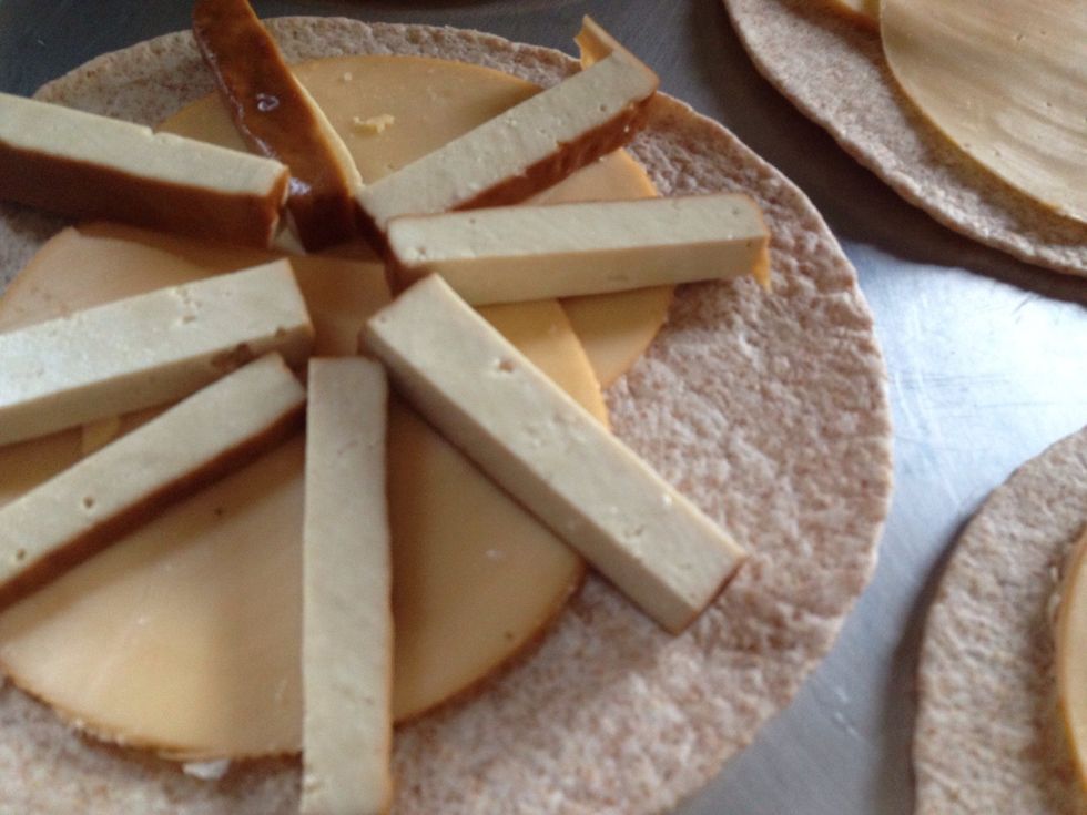 Top with sliced smoked tofu. This is one of my favorite ingredients! It can be cooked or eaten as is.