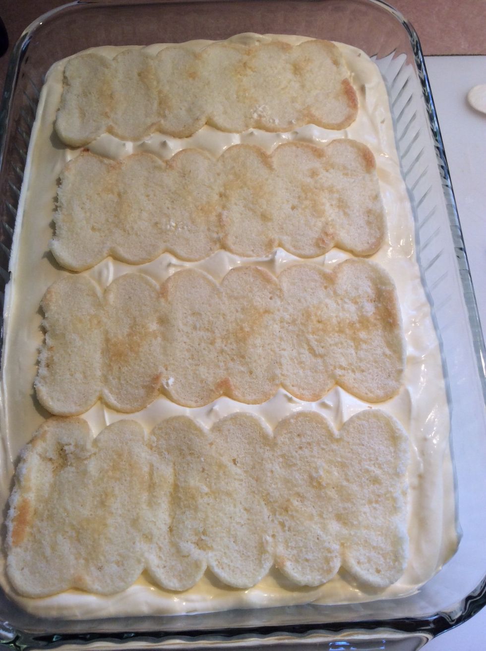 Top with the remaining package of lady fingers.
