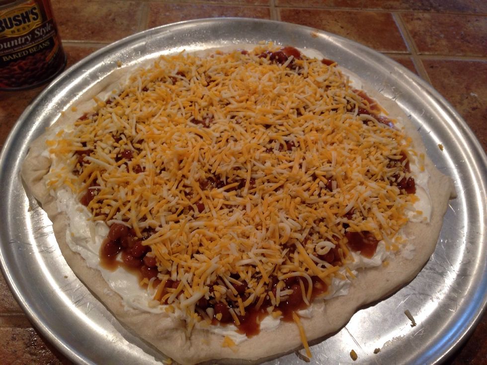 Top with the shredded cheese. Bake at 425 degrees for 20 minutes.