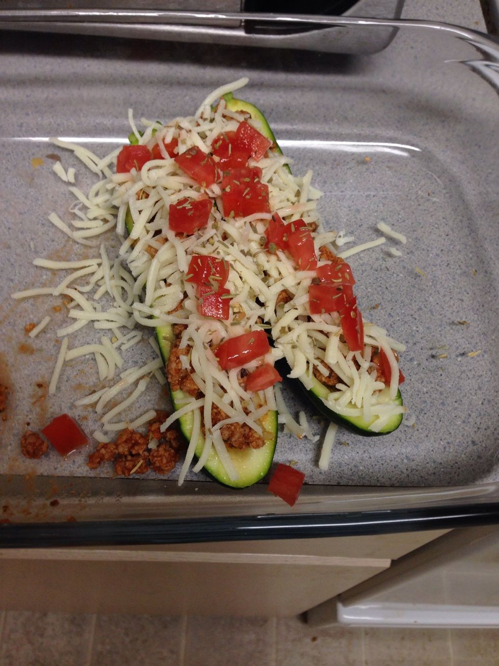 top with tomatoes and cheese