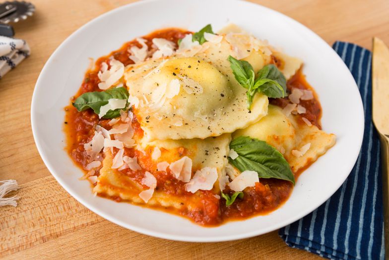 https://guides.brit.co/media-library/top-with-warm-tomato-sauce-a-sprinkling-of-good-olive-oil-shaved-parmesan-and-fresh-basil.jpg?id=23946235&width=784&quality=85