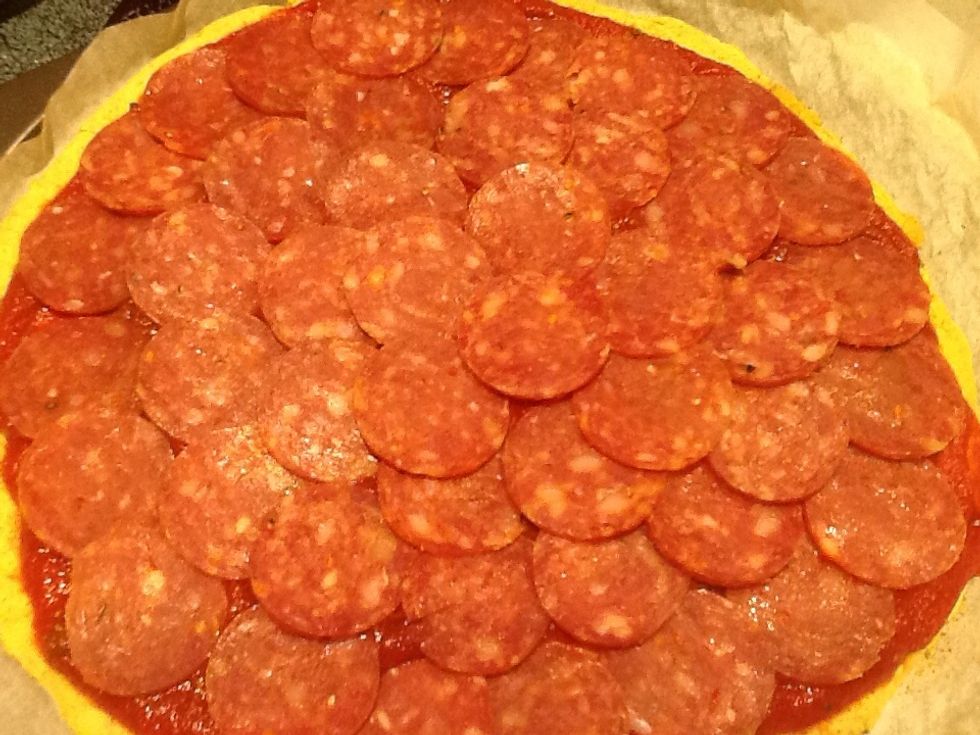 Top with your favorite toppings. For us, sausage and,