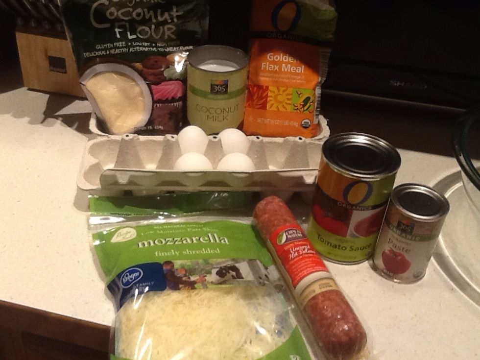 Toppings for us are a can of tomato sauce, paste, seasoning, open nature uncured hot sausage and 2 cups shredded mozzarella.