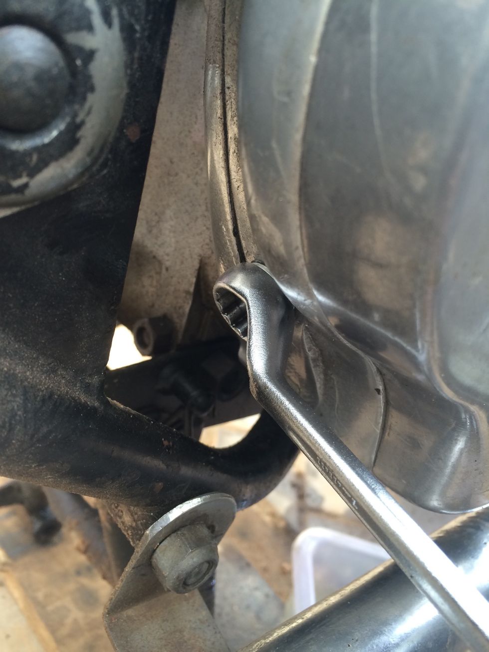 Torque the inspection bolt