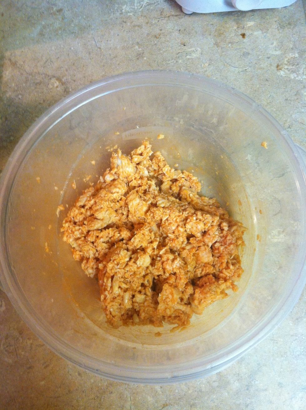 Toss chicken & Frank's RedHot sauce.