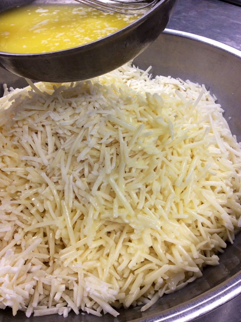 Toss frozen shredded potatoes with butte, oil and seasoning