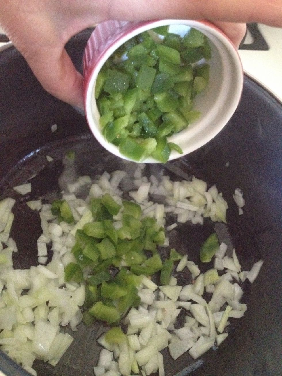 Toss in and saut\u00e9 the pepper and onion.