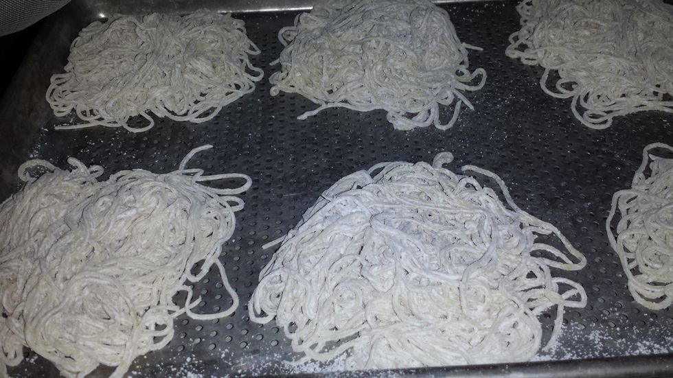 Toss in corn starch or flour to keep from clumping. They are ready to boil.