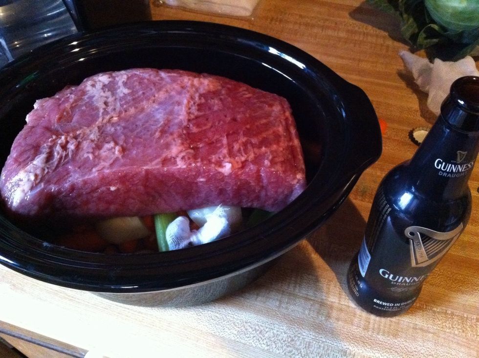 Toss in crock pot..poor bottle of Guinness over the top