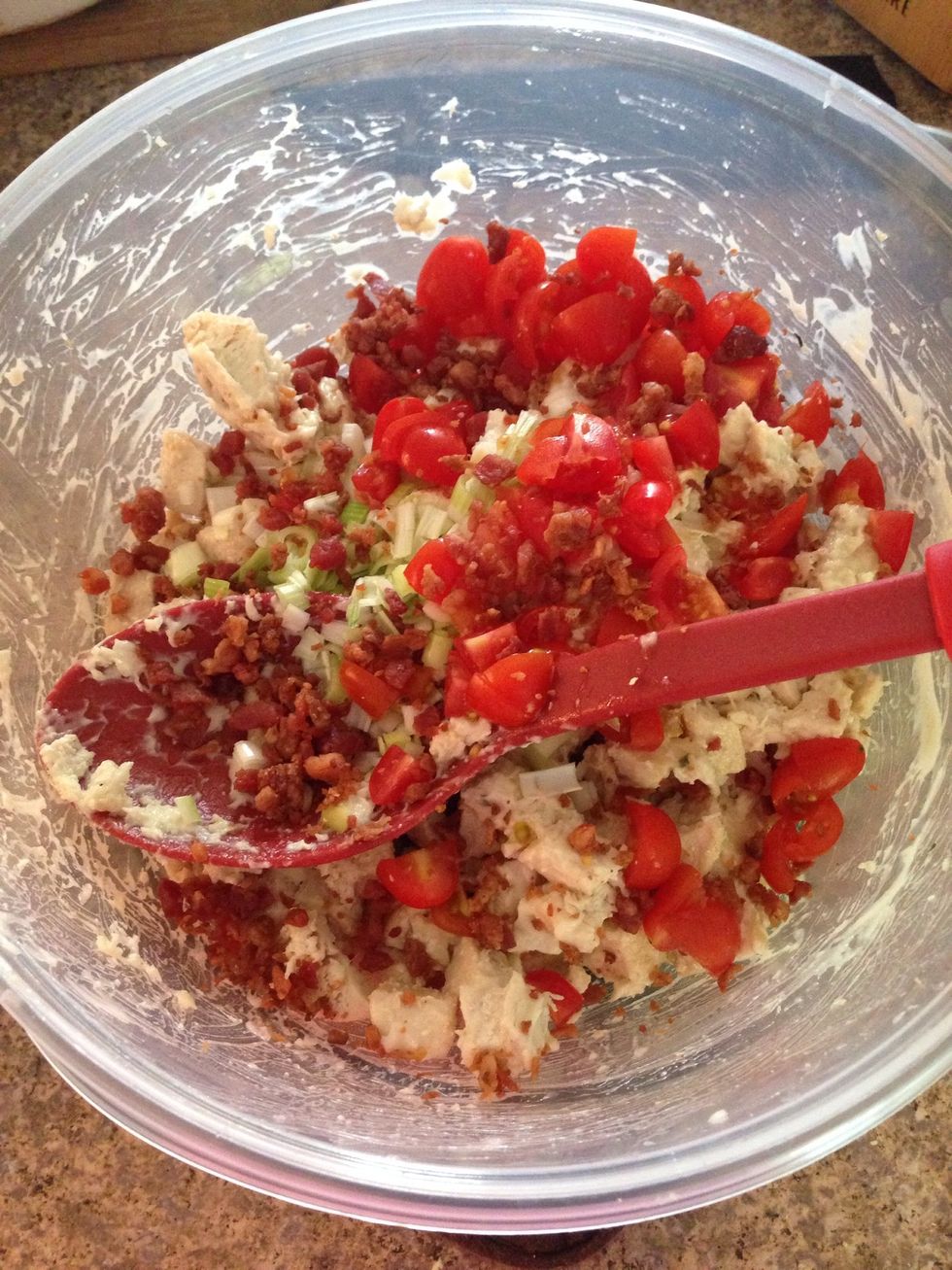 Toss in diced tomatoes, green onions & bacon pieces. I have to do it separately because daughter doesn't like tomatoes & onions. I pull hers out before adding the rest.