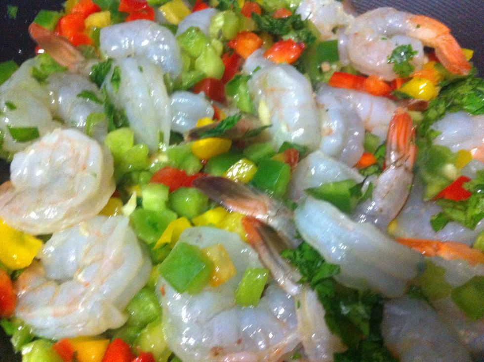 Toss in shrimp, cilantro, and peppers