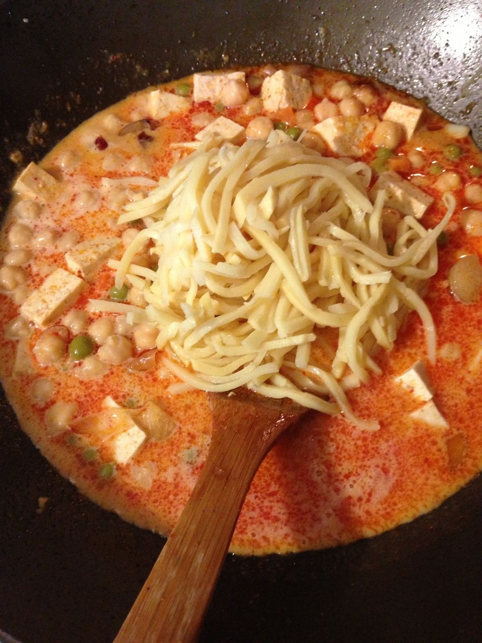 Toss in some chickpeas, bamboo shoots, and the can of peas and carrots.