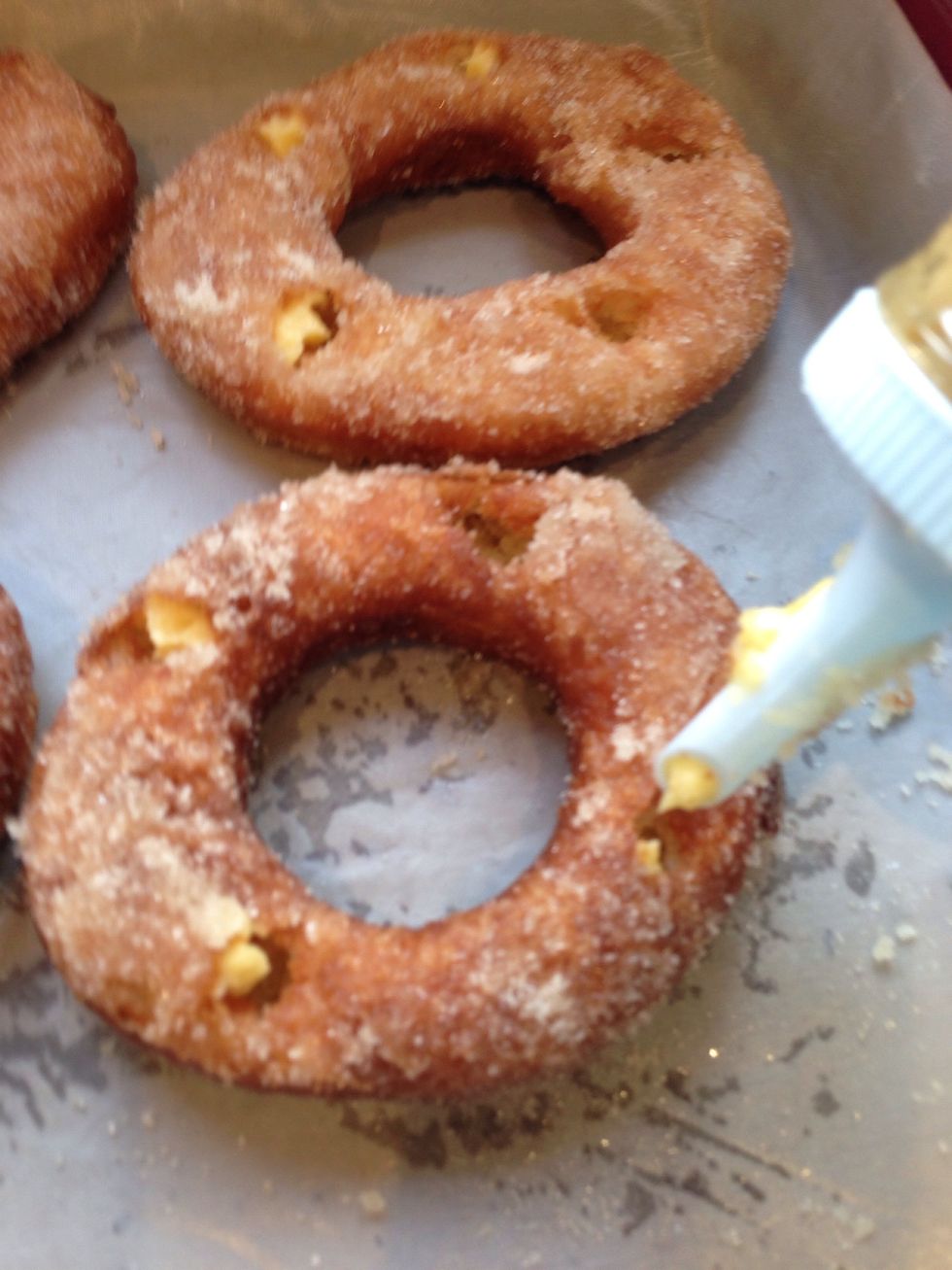 Toss in sugar while still warm and fill with creme patissiere